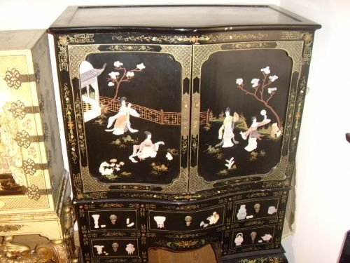 oriental painted cabinet with carved soapstone decoration