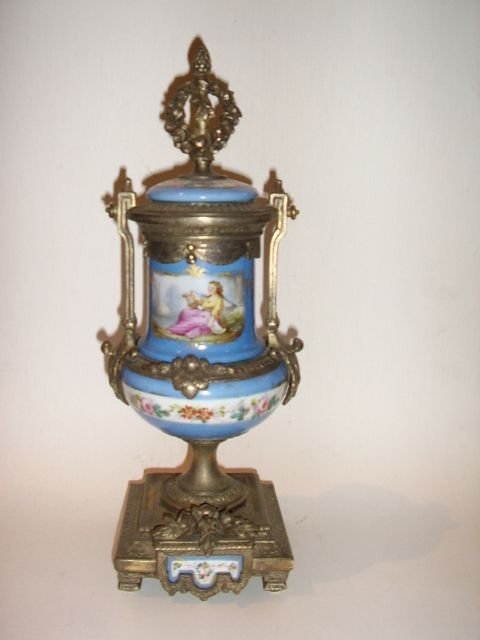 a fine pair of french serves porcelain ormolu clock garnitures c1860