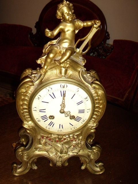 a fine louis style gilt bronze cherub mantle clock by gay vicarino co paris c18001820