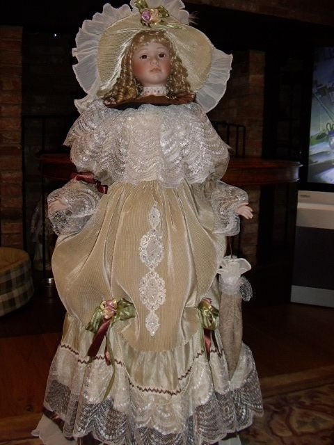 quality porcelain collectors doll in period dress 4 ft high life size
