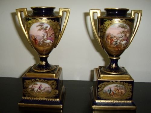 sevres minature hand painted vases with gilt handles 7 inches high