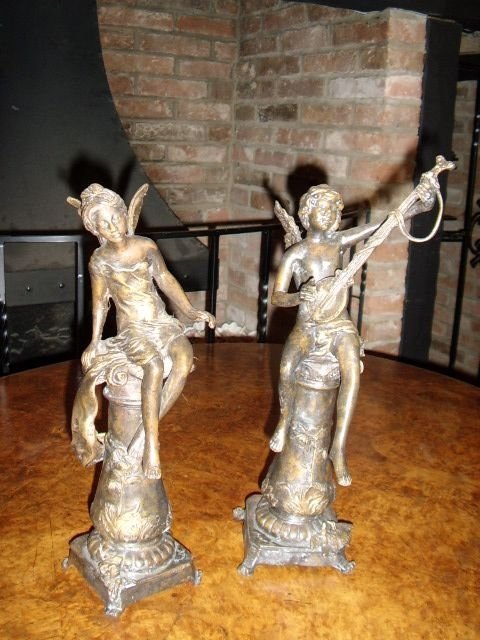 pair of bronze art noveau boy girl angels sitting on plillars playing musical instrument 14 inches high