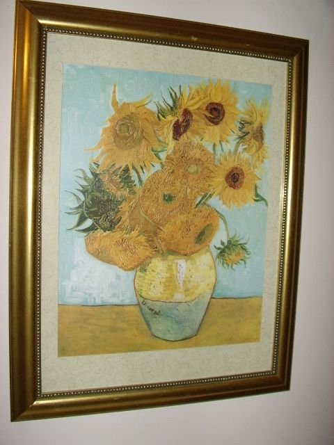 print of famous vincent van gogh's sunflowers in a vase