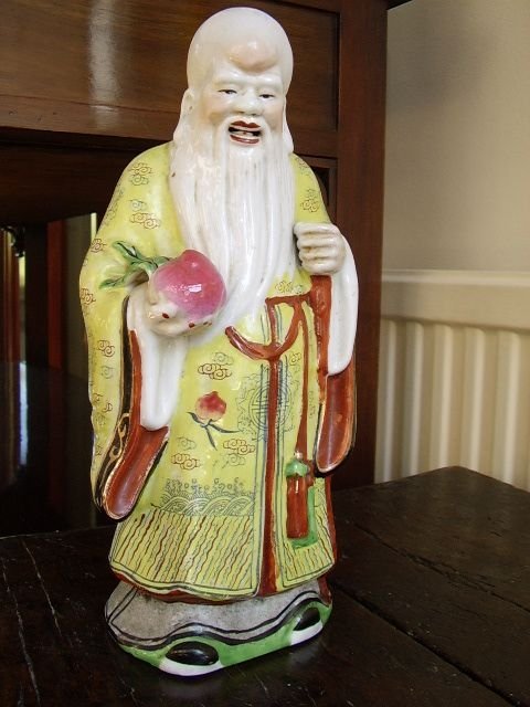 enamel glazed oriental old man holding apple c190020