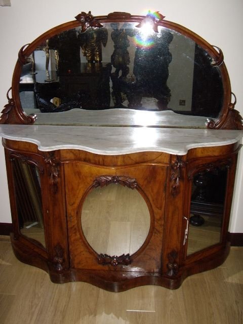 early victorian serpentine shaped credenza in figured walnut with mirror back and decorated with carved acorns leaves c183750