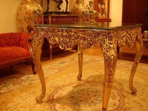 carved gilt games table with green marble mounted top