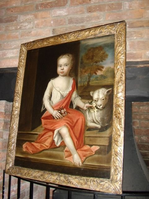 17thcentury portrait of a young girl sitting with lamb