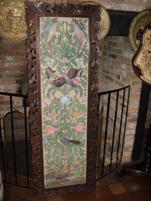 chinese silk hand painted wall screen in carved mahogany frame depicting flowers tropical birds one of a pair offered separately