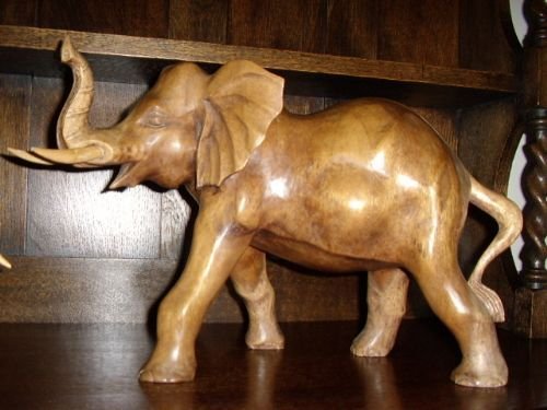 art deco pair of large scale carved walnut elephants height 105 x length 175 ins