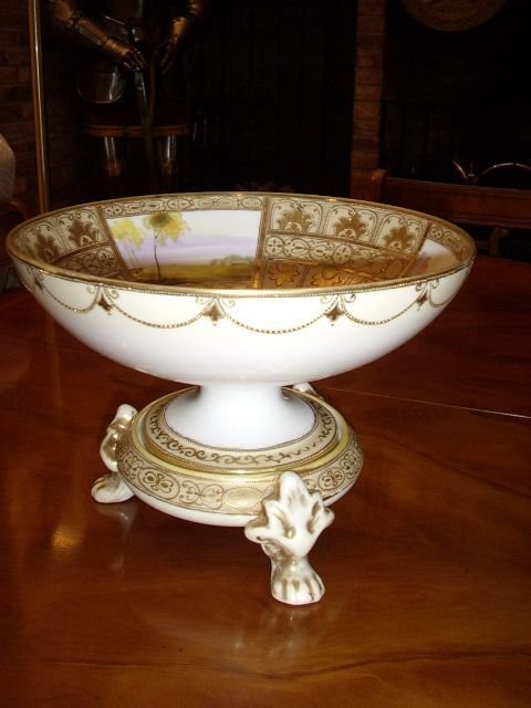 noritake comport on stand with three leaf feet c191020 hand painted with chaised gold decoration inset with landscape panels measuring 1025 inches in diameter