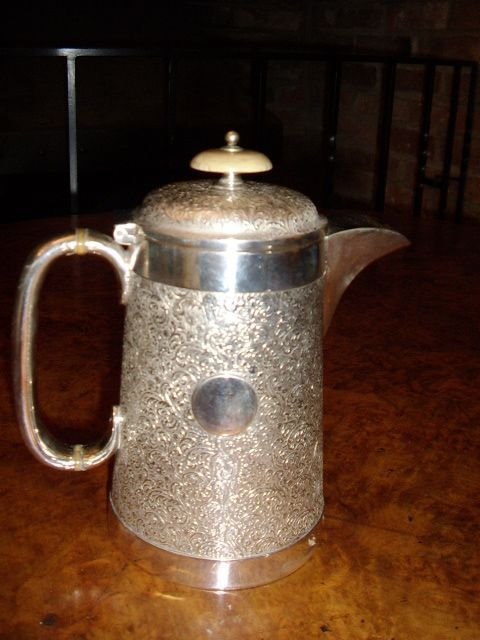 silver plated coffee pot with etched design bone insulators button on lid