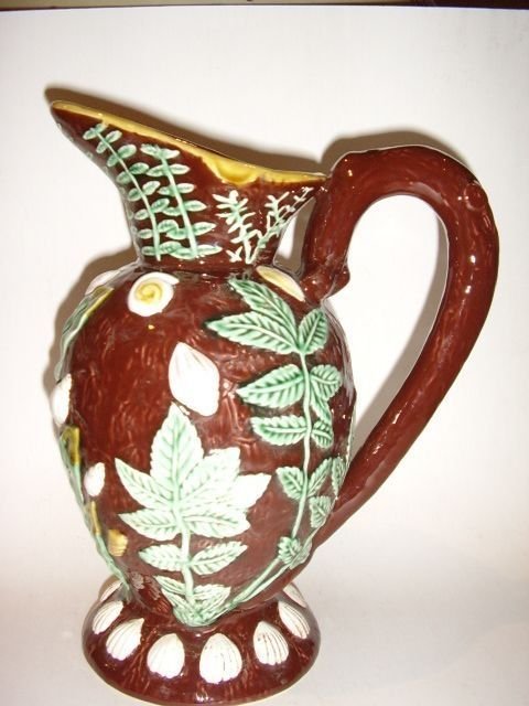 majolica jug decorated with leaves shells 8 inches high c1910