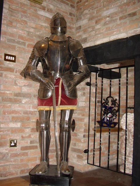 spanish suit of armour hand crafted from heavy polished stainless steel 6ft 3 high on wooden painted plynth stand