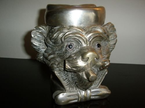 monkey head tobacco jar with hinged lid in the form of a fez cap being hand crafted from highly polished faux silver metal alloys measuring 65 inches high