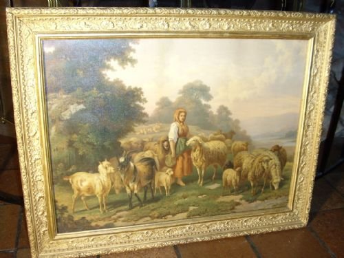 victorian textured oileograph under glass of a lady herder feeding sheep presented in the original decorative gilt frame size 23 x 18 inches