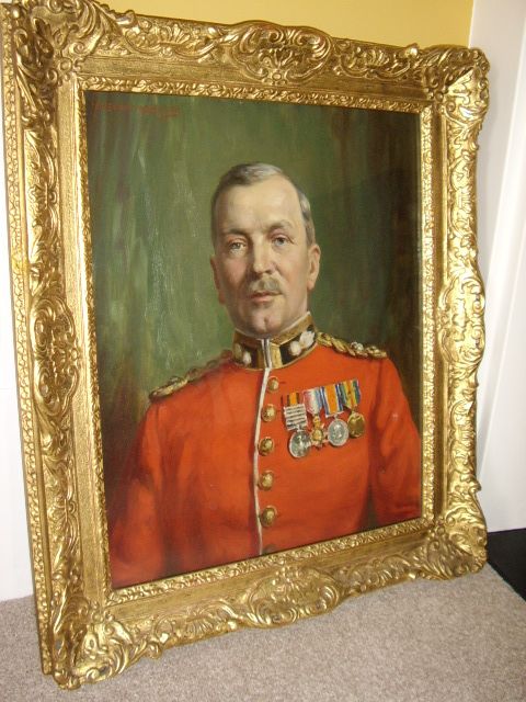 military oil portrait painting of a lieutenant colonel grenadier guard wearing his red tunic medals by respected english school artist alfred egerton cooper being presented in a decoratly crafted solid wooden gilt frame size 31 x 27 inches