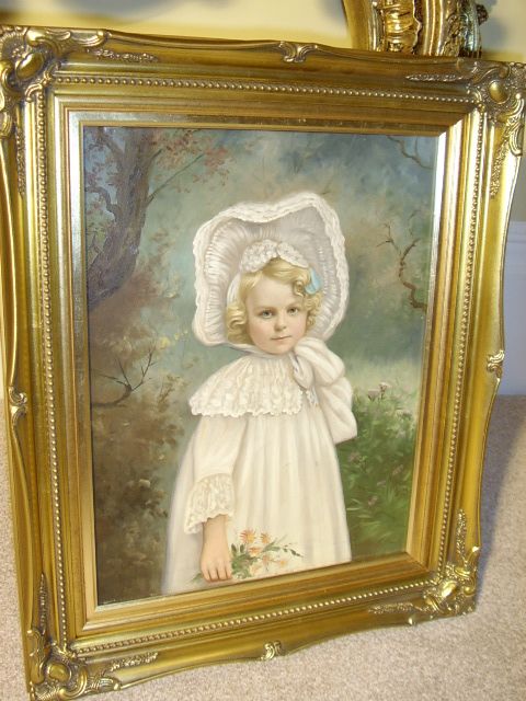 19thcentury victorian oil on canvas portrait of a beautiful young girl wearing her cotton lace white dress with bonnet tied under chin seen holding flowerspresented in a swept gilt later frame size 2325 x 1925 inches