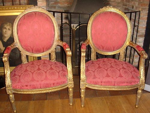 pair of carved wooden gilt salon armchairs 181040
