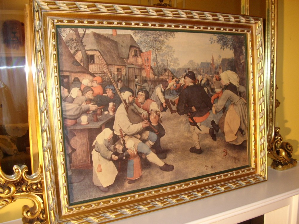 oileograph print on canvas of dutch tavern scene depicting a 17th century genre scene in heavy carved wooden gilt frame