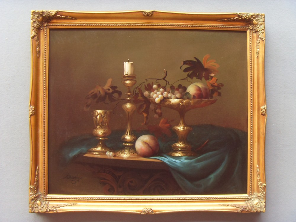 fine quality oil painting of still life fruit by sought after hungarian artist jozsef molnar presented in the original swept gilt decorative frame
