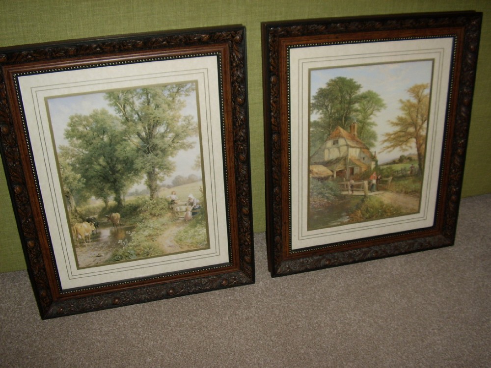 pair of fine country prints of cattle watering cottage in ornate mahogany frames 20 x 24 inches