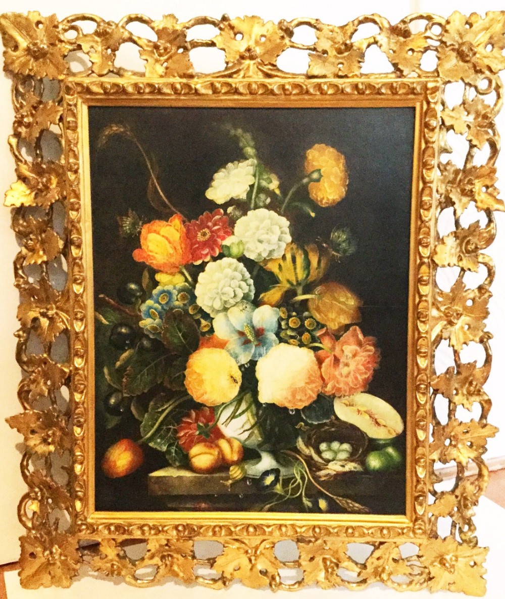 still life flower print embellished in oils set within florentine carved frame1899 to 1930 european