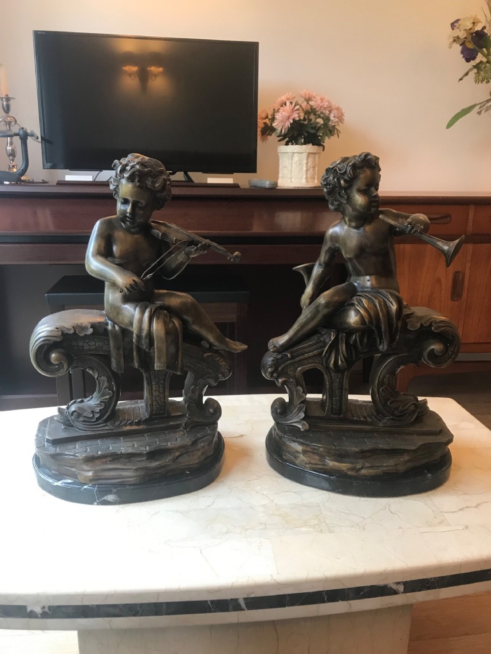 pair art deco bronze cherub musicians on black marble plinths